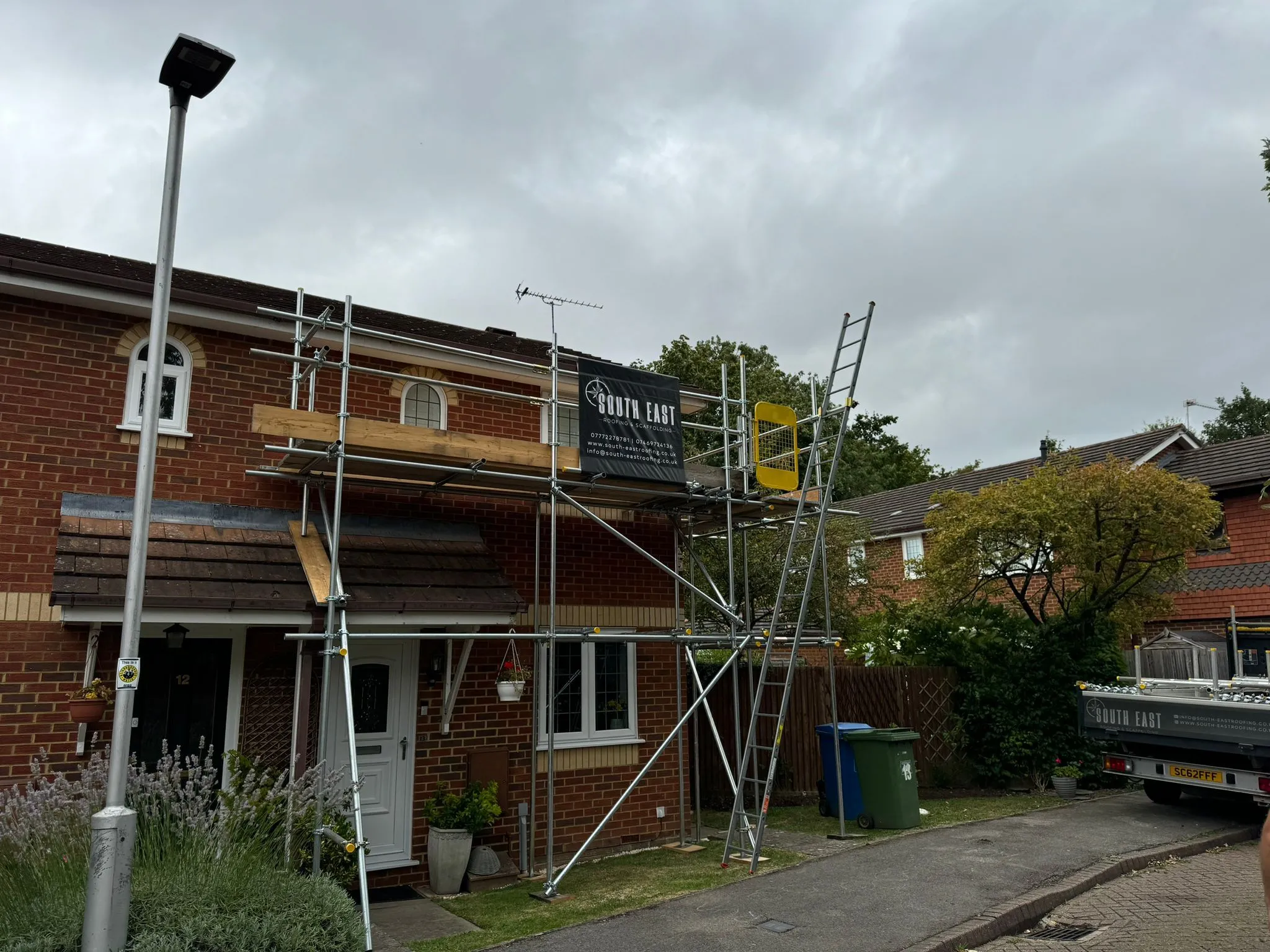 A building with scaffolding on the side of it.